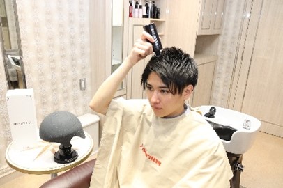 育毛剤塗布後にスパニストキャップを使用